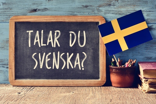 Svensk flag og tavle - lær at snakke svensk
